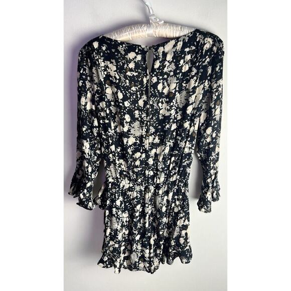 FREE PEOPLE All The Right Ruffles Romper in Black Raven Combo. Size Small - Picture 4 of 11